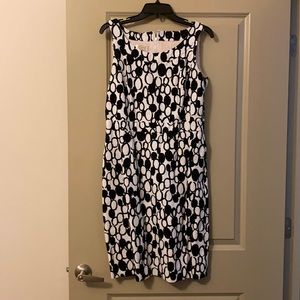 Black and white dress with circle design.